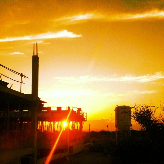 Sunset over a construction site, Torrevieja, Spain. June, 29, 2014